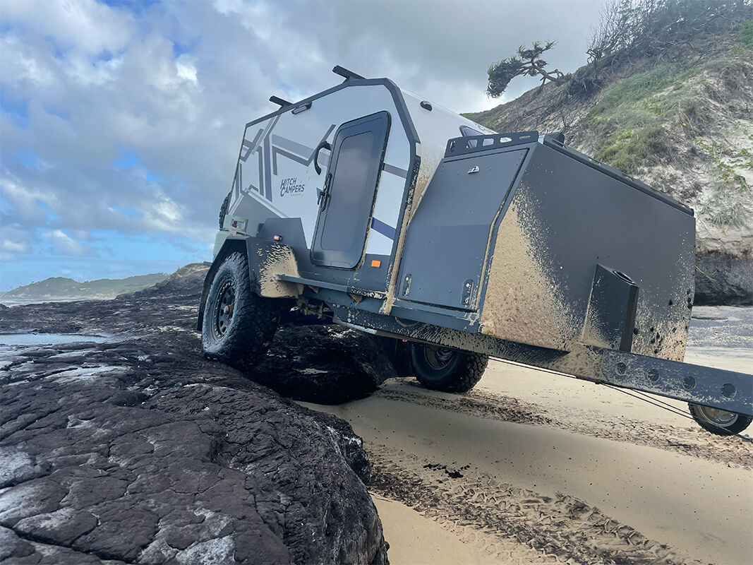 sand driving with teardrop camper
